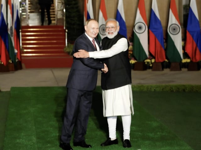 russia s president vladimir putina and indian prime minister narendra modi   reuters file