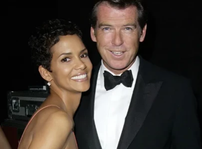 halle berry credits pierce brosnan for restoring her faith in men during james bond shoot