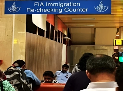 passenger arrested at karachi airport with more than 47 visas on mobile phone