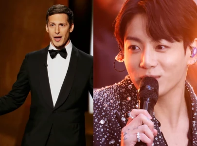 andy samberg praises bts jungkook s standing next to you fans celebrate global admiration