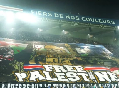 psg fans display free palestine banner during champions league match