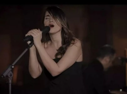 iranian singer taken into custody after virtual performance without hijab