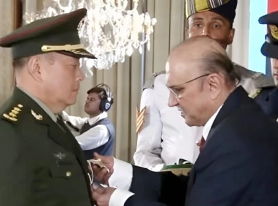 president zardari honours chinese general li qiaoming with nishan i imtiaz military