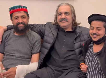 k p cm gandapur meets pti worker pushed off container during protest