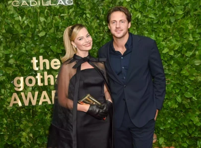 margot robbie praised for parenting potential as she prepares for motherhood