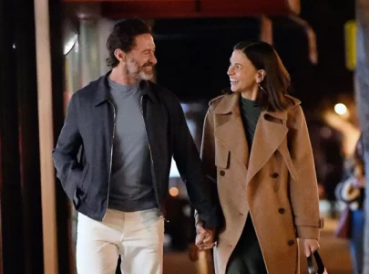 hugh jackman and sutton foster are all smiles while strolling hand in hand after dinner in l a