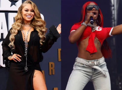 latto and sexyy red put feud aside to join flo milli at spotify s the gold standard art exhibition