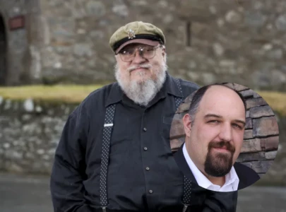 larry correia mocks george r r martin in dedication of new epic fantasy novel heart of the mountain