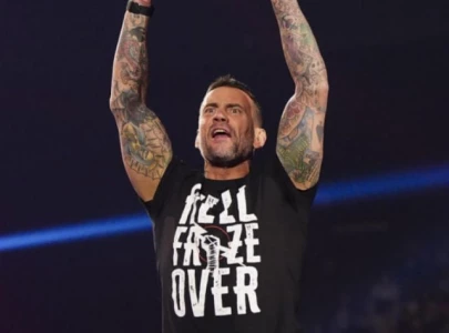 cm punk reunites with rey mysterio after 11 years at wwe event