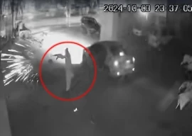 watch firing targets car showroom in rawalpindi