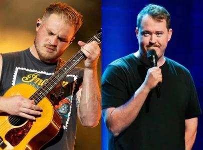 zach bryan and shane gillis compete in chugging contest with barstool sports