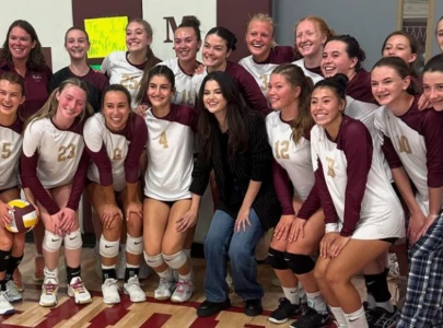 selena gomez surprises fans by attending high school volleyball game in colorado