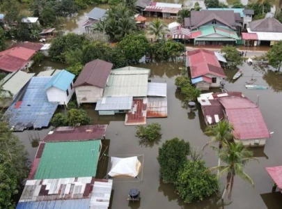malaysia floods displace over 37 000 kelantan state hit the worst