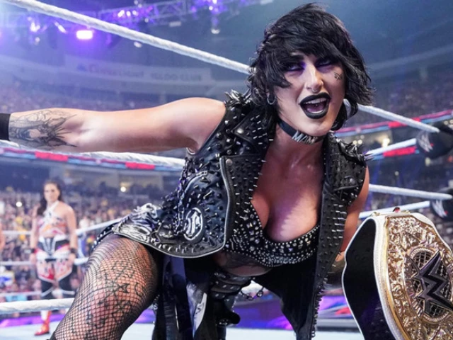 rhea ripley wins women s world title celebrates with legend during wwe raw netflix debut