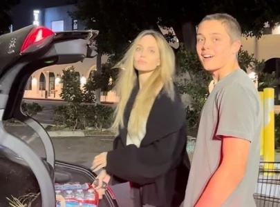 angelina jolie steps up with son knox to aid la wildfire victims