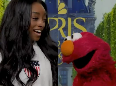 watch simone biles reignites sesame street s elmo and rocco feud at paris olympics 2024 watch simone biles reignites sesame street s elmo and rocco feud at paris olympics 2024