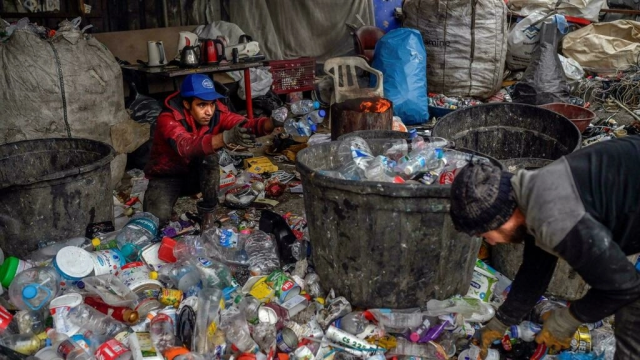 refugees dig up plastic bottles glass and other waste they then sort and sell in bulk afp refugees dig up plastic bottles glass and other waste they then sort and sell in bulk afp