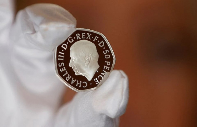 the official coin effigy of britain s king charles iii is seen on a 50 pence coin unveiled by the royal mint in london britain september 29 2022 reuters peter nicholls the official coin effigy of britain s king charles iii is seen on a 50 pence coin unveiled by the royal mint in london britain september 29 2022 reuters peter nicholls