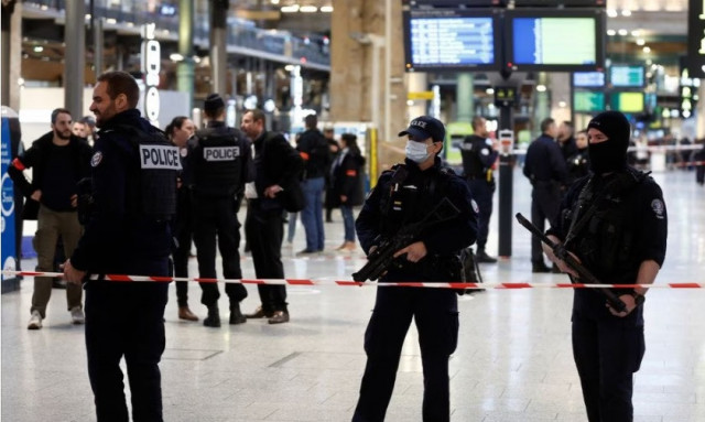 french police secure the area after a man with a knife wounded several people at the gare du nord train station in paris france january 11 2023 reuters benoit tessier french police secure the area after a man with a knife wounded several people at the gare du nord train station in paris france january 11 2023 reuters benoit tessier