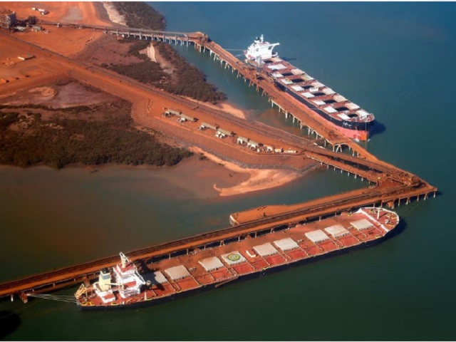 ships waiting to be loaded with iron ore are seen at the fortescue loading dock located at port hedland in the pilbara region of western australia december 3 2013 photo reuters ships waiting to be loaded with iron ore are seen at the fortescue loading dock located at port hedland in the pilbara region of western australia december 3 2013 photo reuters