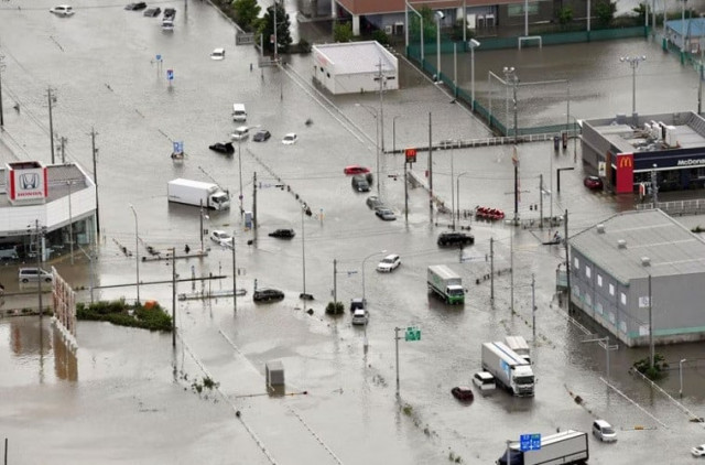 a flooded intersection following heavy rain brought about by typhoon mawar is pictured from a kyodo news helicopter in toyokawa aichi prefecture central japan in this photo taken by kyodo on june 3 2023 photo reuters