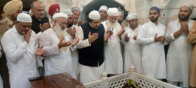 pakistan s charge d affaires to india aizaz khan and pilgrims offered prayers for pakistan s progress photo express