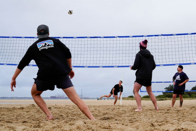brendan alexander plays a game of volleyball with friends at st kilda west beach on the second day of eased coronavirus disease covid 19 lockdown regulations set to curb the outbreak in melbourne australia october 23 2021 photo reuters brendan alexander plays a game of volleyball with friends at st kilda west beach on the second day of eased coronavirus disease covid 19 lockdown regulations set to curb the outbreak in melbourne australia october 23 2021 photo reuters