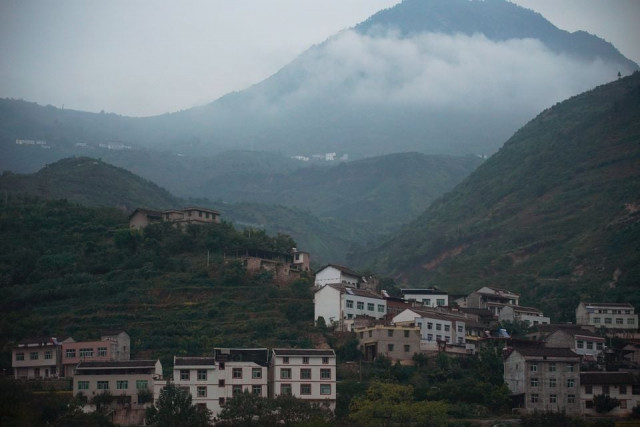 houses are seen at the foot of a mountain in yaan sichuan province china september 9 2020 picture taken september 9 2020 reuters houses are seen at the foot of a mountain in yaan sichuan province china september 9 2020 picture taken september 9 2020 reuters