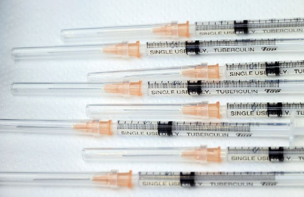 syringes with doses of the coronavirus disease covid 19 vaccine are displayed at the tokyo metropolitan cancer and infectious diseases center komagome hospital in tokyo japan march 5 2021 photo reuters