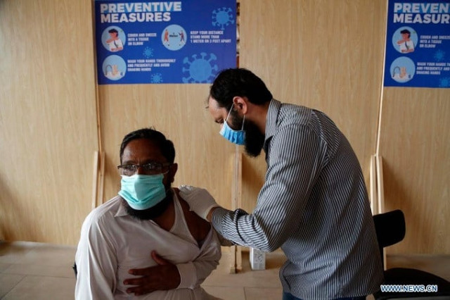 a man receives a dose of the chinese covid 19 vaccine at a vaccination center in islamabad capital of pakistan on july 13 2021 xinhua ahmad kamal a man receives a dose of the chinese covid 19 vaccine at a vaccination center in islamabad capital of pakistan on july 13 2021 xinhua ahmad kamal