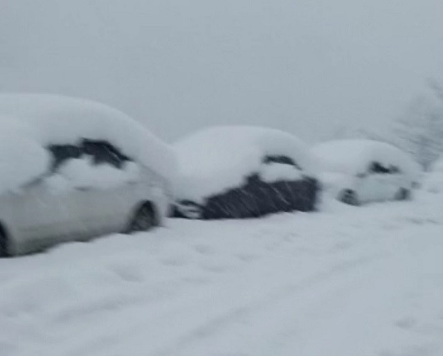 vehicles of the tourists are seen stranded near lowari tunnel dir on monday photo express