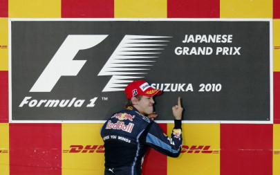 vettel leads red bull s 1 2 in japan