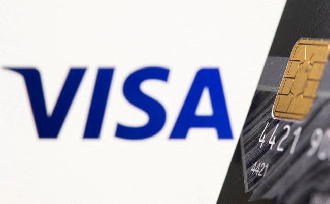 credit card is seen in front of displayed visa logo in this illustration taken july 15 2021 photo reuters