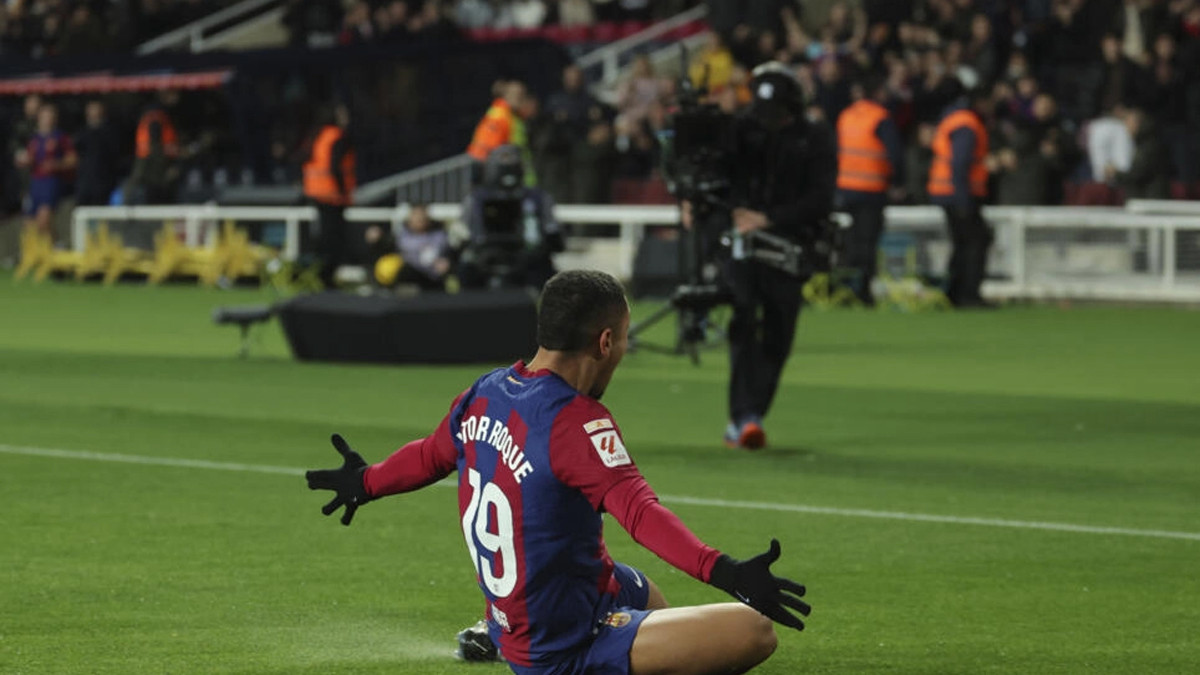 barcelona s brazilian forward vitor roque celebrates scoring the opening goal against osasuna at the olympic stadium photo afp