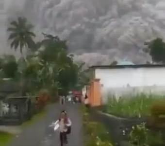 thousands flee as mount semeru volcano erupts in indonesia