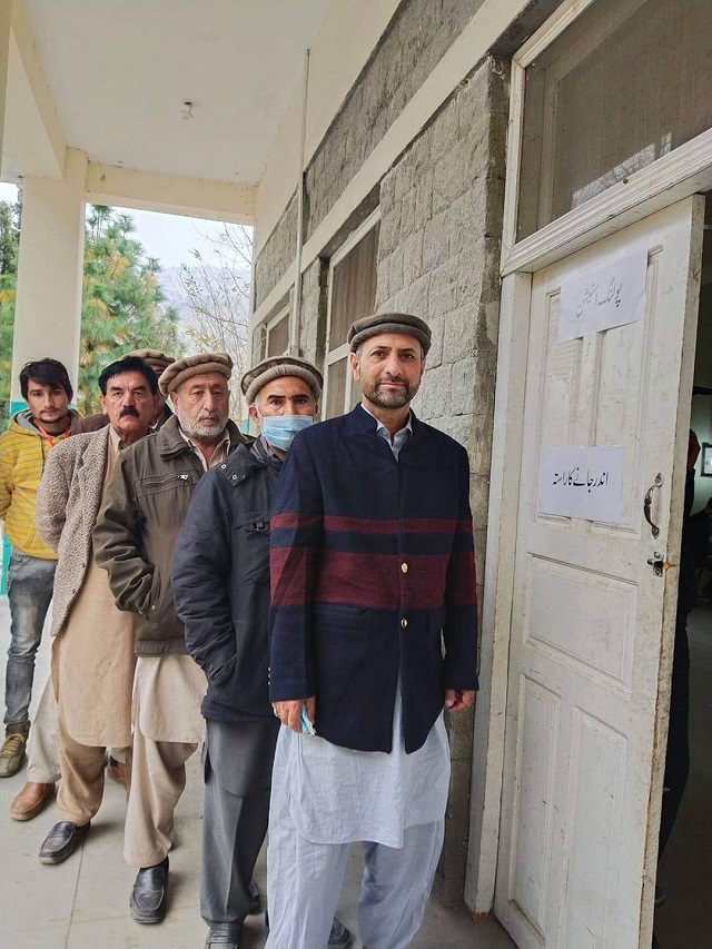 voters stand in a queue outside a polling station in nomal gilgit photo express