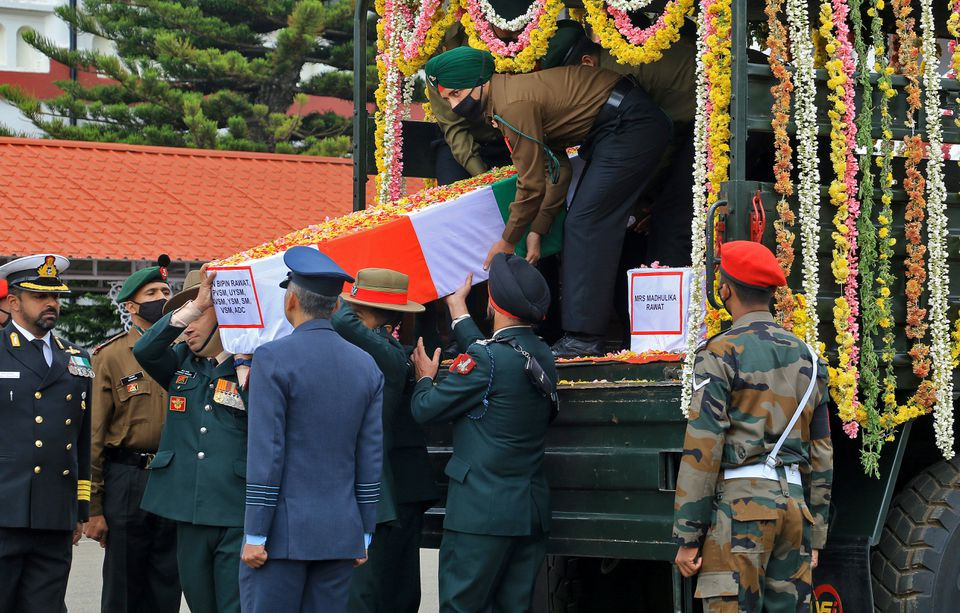 army officers carry the coffin containing the mortal remains of india s chief of defence staff general bipin rawat in wellington in the southern state of tamil nadu india december 9 2021 reuters