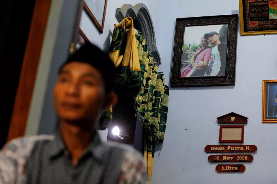 finding their bodies indonesian fan s desperate search for family after soccer stampede finding their bodies indonesian fan s desperate search for family after soccer stampede