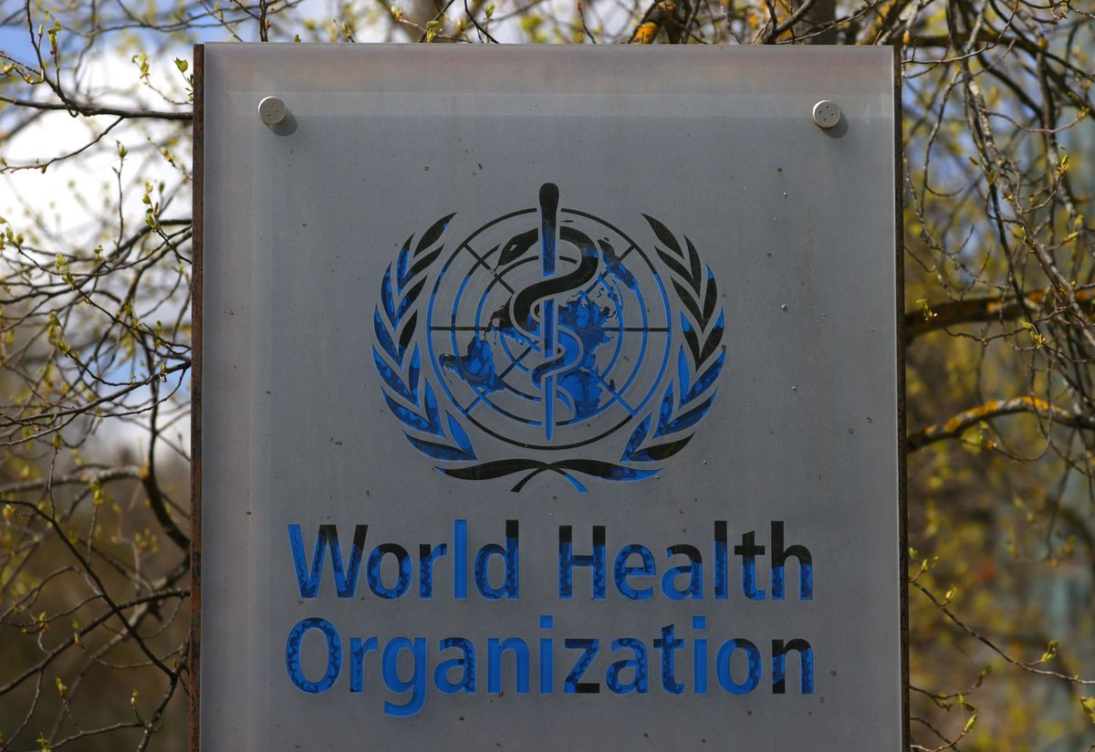 a logo is pictured outside a building of the world health organization who during an executive board meeting on update on the coronavirus disease covid 19 outbreak in geneva switzerland april 6 2021 photo reuters