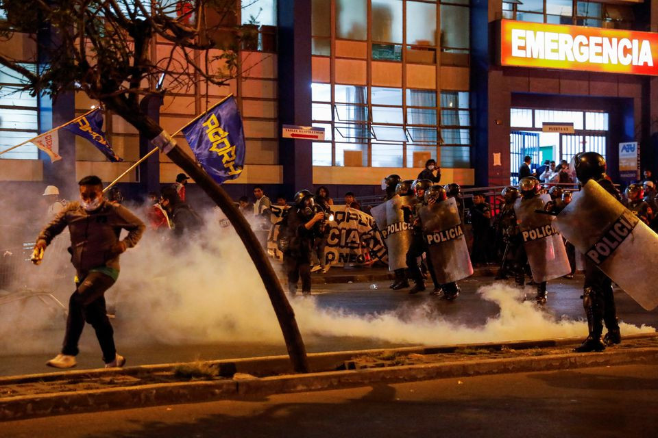 police officers clash with demonstrators during a protest that is continuing despite a government proposal to bring forward elections following the ouster of peruvian leader pedro castillo in lima peru december 13 2022 reuters alessandro cinque