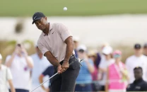 woods admits to being rusty on comeback