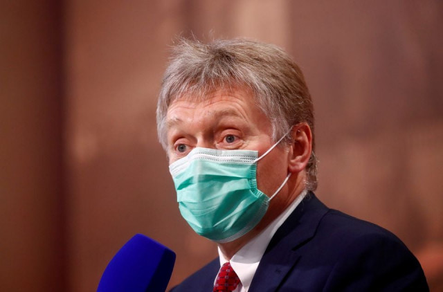 kremlin spokesman dmitry peskov wearing a protective face mask attends russian president vladimir putin s annual end of year news conference held online in a video conference mode in moscow russia december 17 2020 photo reuters file kremlin spokesman dmitry peskov wearing a protective face mask attends russian president vladimir putin s annual end of year news conference held online in a video conference mode in moscow russia december 17 2020 photo reuters file