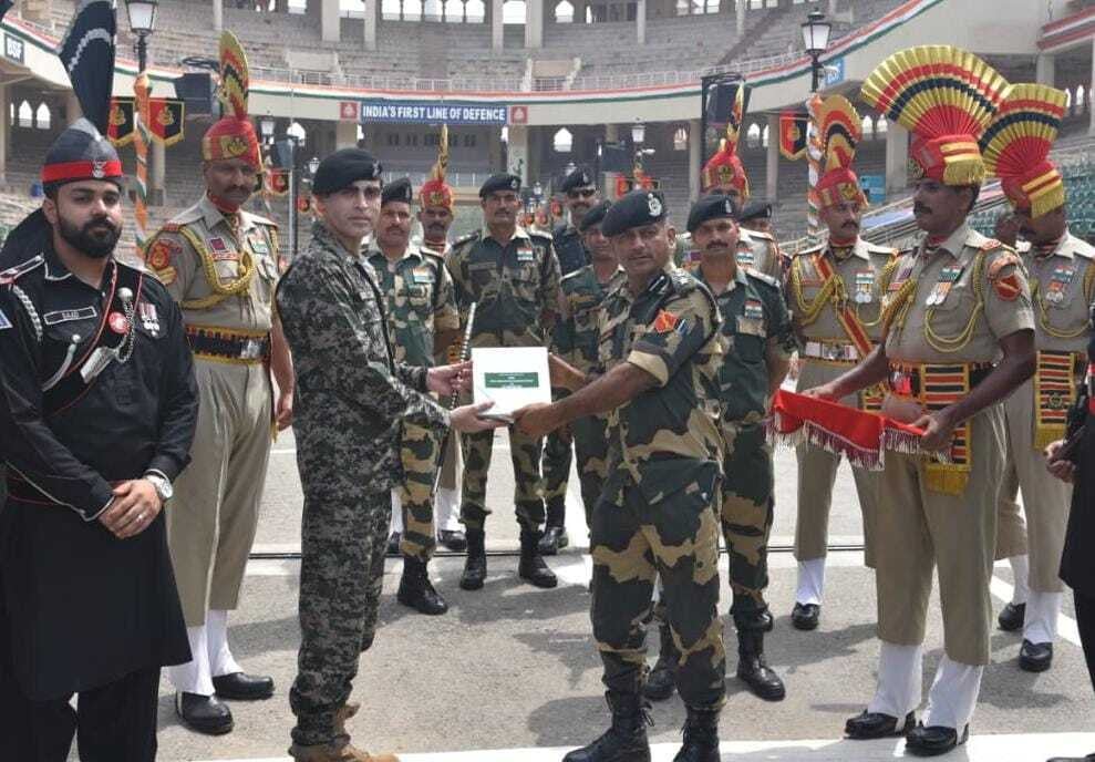 as a symbol of goodwill and harmony pakistani and indian forces exchanged sweets at the wagah border on the occasion of pakistan s 76th independence day