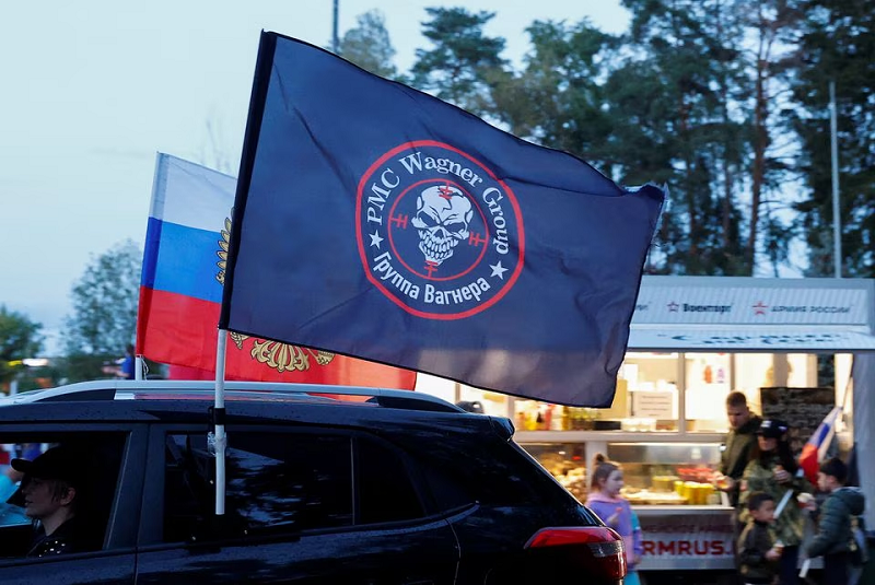 a flag with the logo of wagner private mercenary group is attached to a car during an automobile rally in the moscow region russia august 23 2023 photo reuters