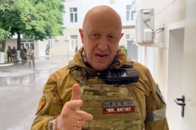 wagner boss yevgeny prigozhin speaking inside the headquarters of the russian southern military district in the city of rostov on don photo afp