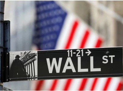 wall street surges to all time closing high