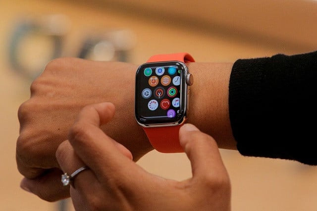 an apple store employee shows the series 5 apple watch during the preview of the redesigned and reimagined apple fifth avenue store in new york us september 19 2019 photo reuters
