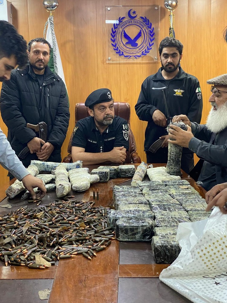 Weapons and ammunition intercepted at Torkham by Customs staff. PHOTO: EXPRESS