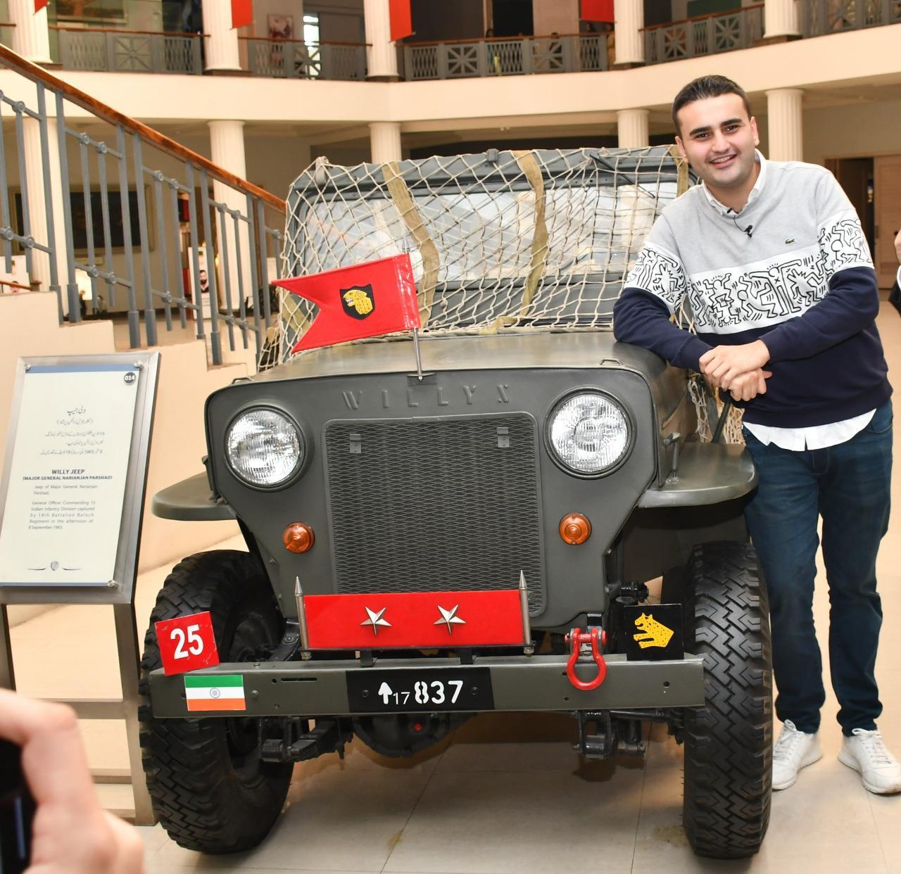 turkish chef burak ozdemir poses with a captured jeep of an indian general at the army museum rawalpindi photo express