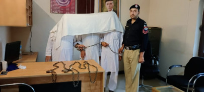 k p police rescues woman chained locked up by brothers in swabi
